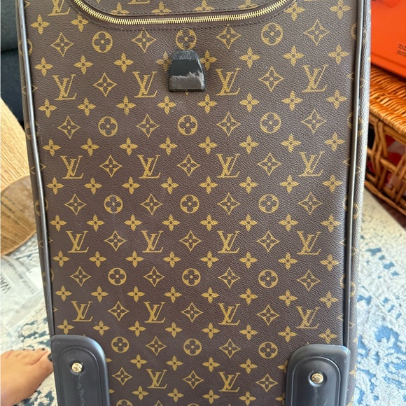 Louis Vuitton canvas rolling duffle bag, gently used. - Picture 4 of 14